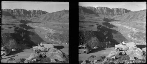 [Overview of two motor vehicles on the road, two men, the river and the landscape, World War II] [picture] : [Iran] / [Frank Hurley]