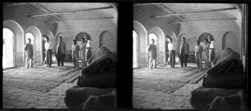 Carpet buyers Kerman [World War II] [picture] : [Kerman, Iran] / [Frank Hurley]