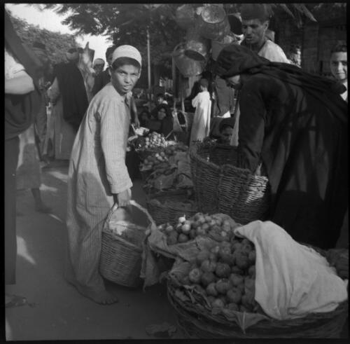 Sunday shots, Iran [street market scene, World War II] [picture] : [Iran] / [Frank Hurley]