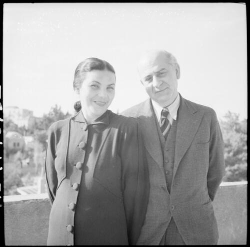 [Portrait of a man and a woman with their hands behind their backs] [picture] : [Iran, World War II] / [Frank Hurley]