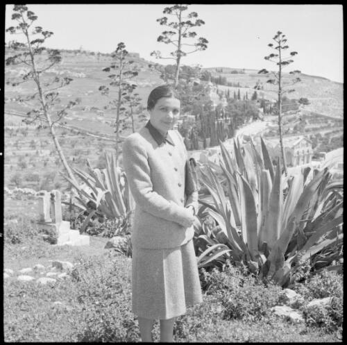 [Portrait of a woman in a garden] [picture] : [Iran, World War II] / [Frank Hurley]