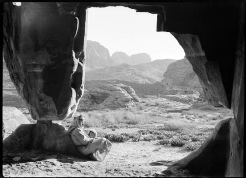 [Erosion of the rock walls of tombs and chambers in the dwellings of a few poor Bedouins ca. 1940-1946] [picture] : [Petra Valley, Jordan] / [Frank Hurley]