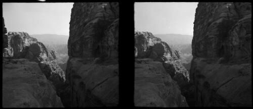 Glimpse in the valley of Petra, lying between the Dead Sea & the Gulf of Aquaba, stereo [narrow ravine with valley behind ca. 1940-1946] [picture] : [Petra Valley, Jordan] / [Frank Hurley]