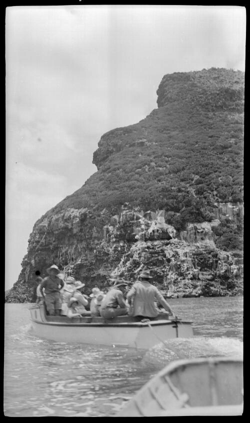 [Group of unidentified people in a motorboat, Lord Howe Island, 1] [picture] / [Frank Hurley]