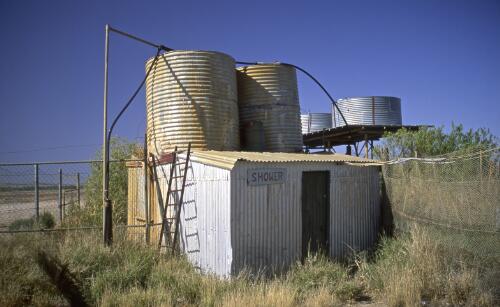Shower facilities at the back of the Betoota Hotel, far western Queensland, approximately 1995 / Robin Smith