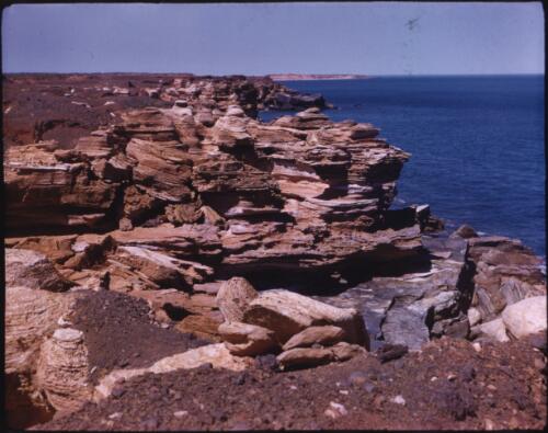 [Rock formations on the coast, Western Australia, 4] [transparency] / [Frank Hurley]