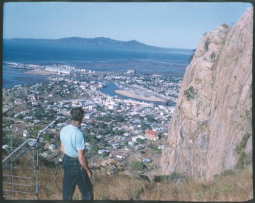 [Unidentified man looking over Castle Hill, Townsville?] [transparency] / [Frank Hurley]
