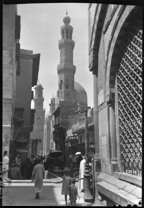 [The tall minaret of Mosque Sultan Barquq 1388-1399 AD, with the small Minaret of En Nasir & in the distance the Mosque Qalaun 1284 AD] [picture] : [Cairo, Egypt, World War II] / [Frank Hurley]