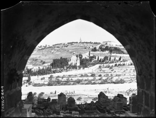 [View through an archway to a cemetery] [picture] : [Cairo, Egypt, World War II] / [Frank Hurley]
