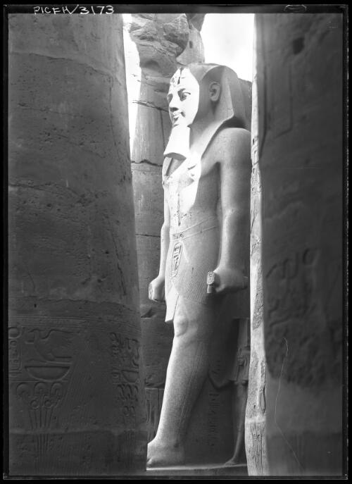 Colossal polished granite statue of Rameses II in Temple of Luxor [picture] : [Egypt, World War II] / [Frank Hurley]