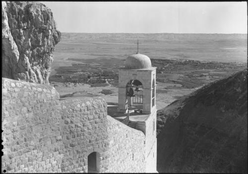 Belfry of Greek Orthodox Convent on Mt Quarantine on western face of Jordan valley [picture] / [Frank Hurley]
