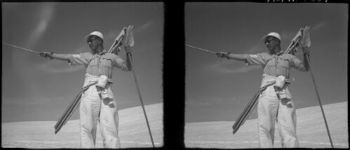 Stereos, tutor of skiers A.I.F. School at Cedars [man pointing with pole] [picture] : [Lebanon, World War II] / [Frank Hurley]