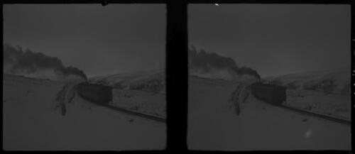 Winter scenes at Ainsofar [train and carriages passing through open country] [picture] : [Syria, World War II] / [Frank Hurley]
