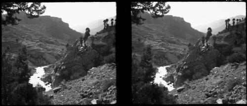 The Nahr Ibrahim near its source at Afqua, Lebanons, the two bridges seen are near the mouth of Nahr Ibrahim R [view from rocky hilltop overlooking river] [picture] : [Lebanon, World War II] / [Frank Hurley]