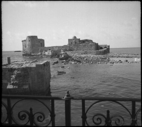 Qu'bat el Bahr Sidon (Crusader ruins) [view from balcony to the Sea Castle ruins] [picture] : [Lebanon, World War II] / [Frank Hurley]