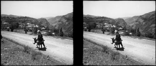 On way to Cedars [villager on donkey heading toward village] [picture] : [Lebanon, World War II] / [Frank Hurley]