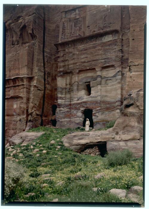 [Bearded man at entrance to partially excavated structure in Petra] [transparency] : [Jordan, World War II] / [Frank Hurley]