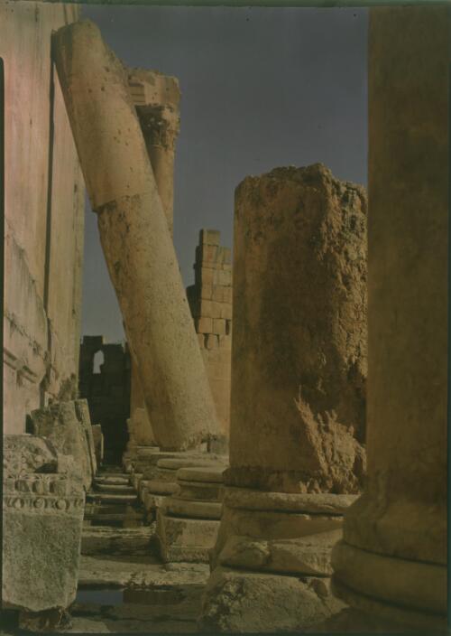 [Temple of Bacchus, Baalbek with the fallen column of an ancient ruin precariously balanced against wall] [picture] : [Lebanon, World War II] / [Frank Hurley]