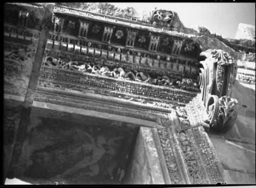 Details of adornment Baalbek, Syria [detail of door surround and ceiling decorated with mythical winged figure, Temple of Bacchus] [picture] : [Lebanon, World War II] / [Frank Hurley]