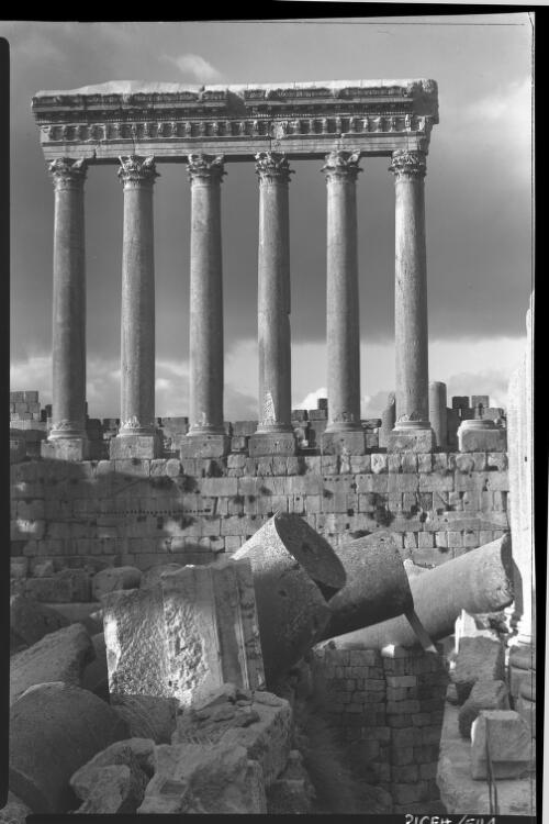 Baalbek Temple of Jupiter Syria, the magnificent columns are all that remain standing of the Temple of Jupiter [frontal view of columns atop stone foundations] [picture] : [Lebanon, World War II] / [Frank Hurley]