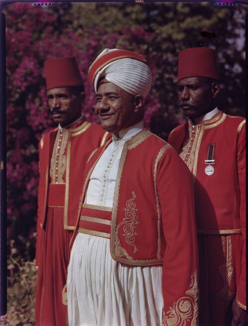 [Portrait of the Palace Kavass or footmen in the Governor General's palace gardens, Khartoum] [picture] : [Sudan, 1940's] / [Frank Hurley]
