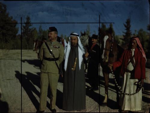 [Portrait of two dignitaries, one in Arab dress with dagger, the other in Allied military dress] [picture] : [Sudan, 1940's] / [Frank Hurley]