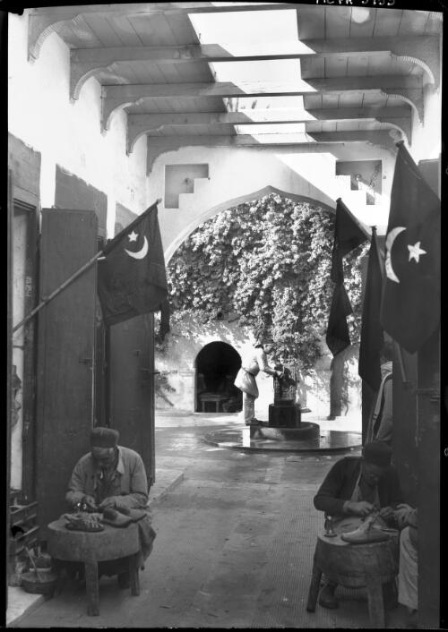 A very lovely vista in the bazaar of the shoemakers at Derna [picture] / [Frank Hurley]