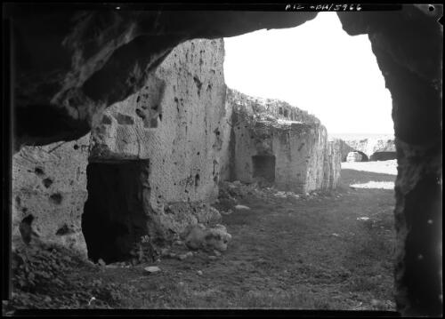 Old ruins near Tocra, possibly Roman Tombs Libia [ca. 1940-1946] [picture] : [Barqah, Libya] / [Frank Hurley]