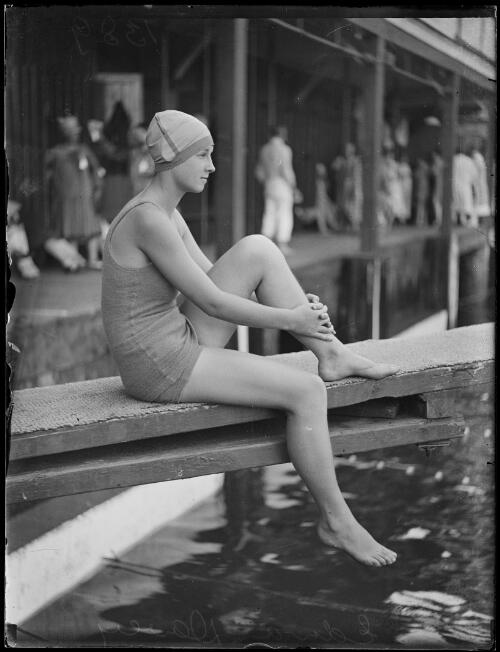 Swimmer Edna Davy sitting beside a pool, New South Wales, ca. 1928 [picture]
