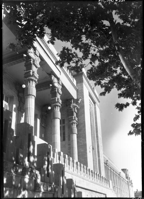 A building with elaborately carved columns including horses topping each one, ca. 1943 [picture] / [Frank Hurley]