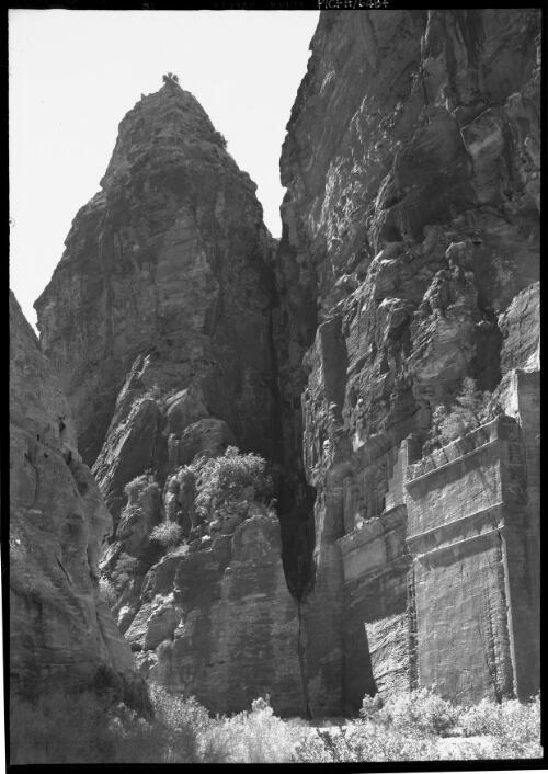 [Facade of Nabatean tomb with double crowstep frieze, Petra] [picture] : [Petra Valley, Jordan] / [Frank Hurley]