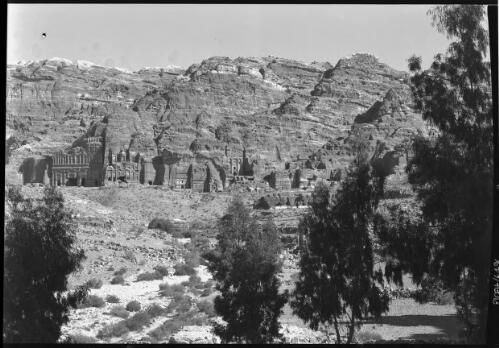 [General view of the Royal Tombs, Petra, including the Palace, the Corinthian Tomb, the Silk Tomb, and the Urn Tomb] [picture] : [Petra Valley, Jordan] / [Frank Hurley]