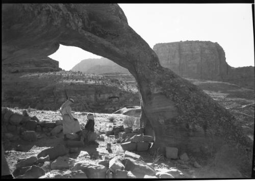 [Two children amongst Petra ruins] [picture] : [Petra Valley, Jordan] / [Frank Hurley]