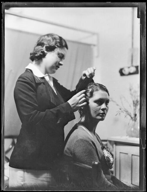 Swimmer Clare Dennis having her hair styled, New South Wales, 17 September 1932 [picture]