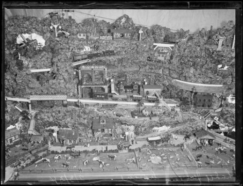 Town scene in the electric model city built by Sir George Julius at his Darling Point home, Sydney, New South Wales, 2 March 1934 [picture]
