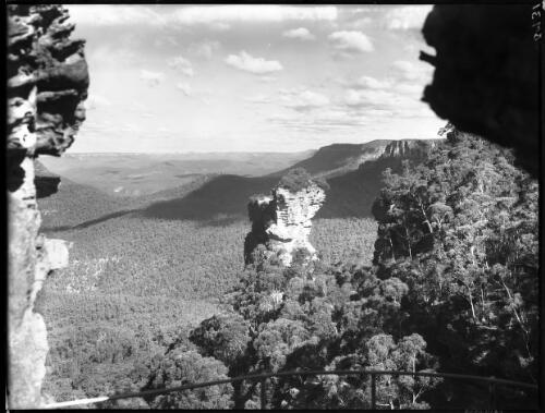 Orphan Rock, long shot with valley at back [picture] : [Blue Mountains, New South Wales] / [Frank Hurley]