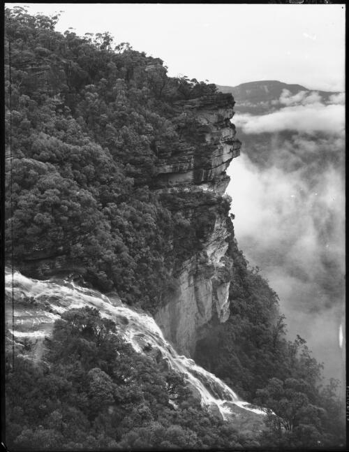 At the head of the Wentworth Falls [picture] : [Blue Mountains, New South Wales] / [Frank Hurley]