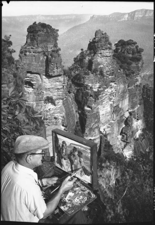 Bill Davis painting the Three Sisters, Katoomba, New South Wales, ca. 1940 [picture] / Frank Hurley