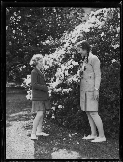 Daughter of Governor Sir Phillip Game, Rosemary Game and another girl talking in the gardens of Government House, Sydney, New South Wales, 3 September 1930 [picture]