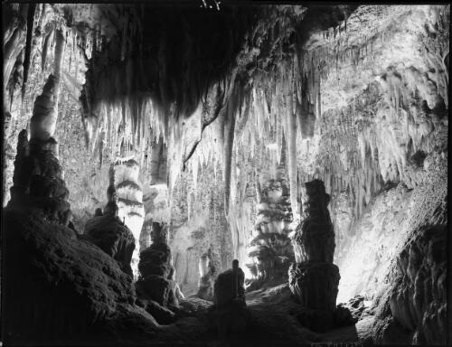 Dramatic lighting effect, interior [Yarrangobilly Caves, New South Wales] [picture] / [Frank Hurley]