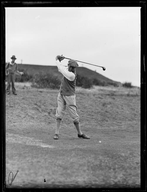 Golf player E. Apperley mid swing at the Open Championships, New South Wales, 21 December 1934 [picture]
