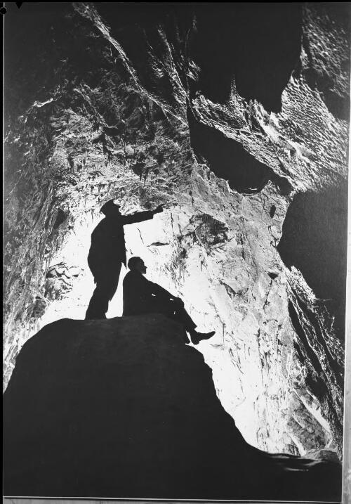 This plate commemorates James Carvosso Wiburd, who retired in 1932 after forty-seven years service at Jenolan Caves [picture] : [Jenolan Caves, New South Wales] / [Frank Hurley]