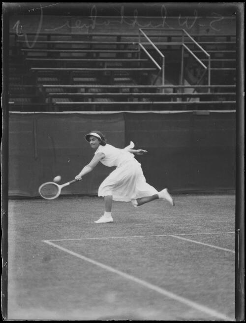 Tennis player Miss S. Whittaker about to hit a backhand shot, New South Wales, 1933 [picture]