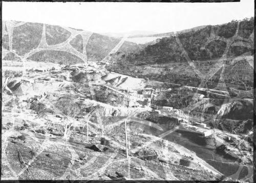 [Construction site of the wall of Eucumbene Dam, then Adaminaby Dam] [picture] : [Snowy Mountains Hydro-Electric Scheme, New South Wales] / [Frank Hurley]