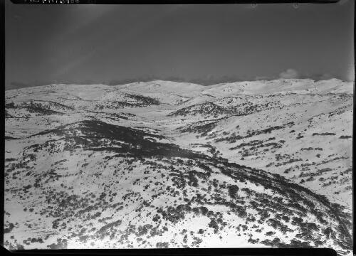 Aerial of Mt Kosciusko, Snowy Mountains Hydro-Electric Scheme, New South Wales [picture] / [Frank Hurley]