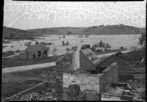 Adaminaby old town being flooded [1] [picture] : [Snowy Mountains Hydro-Electric Scheme, New South Wales] / [Frank Hurley]