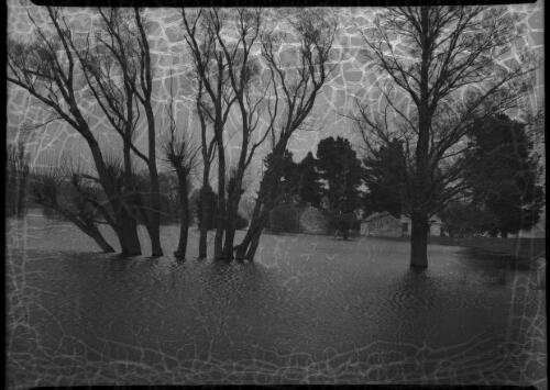 Adaminaby old town being flooded [2] [picture] : [Snowy Mountains Hydro-Electric Scheme, New South Wales] / [Frank Hurley]