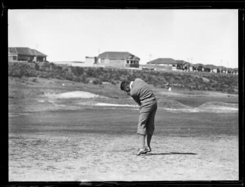 Amateur golfer H. Williams hitting a ball on a golf course, New South Wales, ca. 1930s [picture]