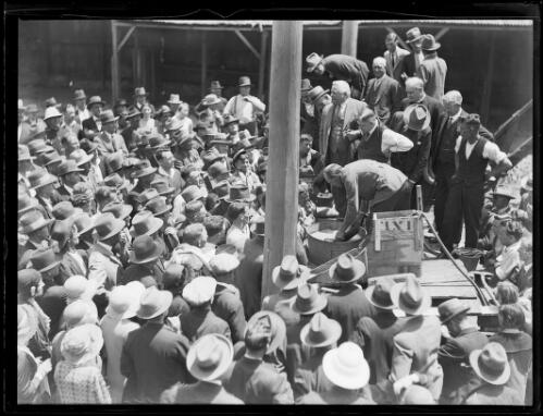 Gold washing demonstration by the Mayor of Redfern Alderman Walder, New South Wales, 15 November 1932 [picture]
