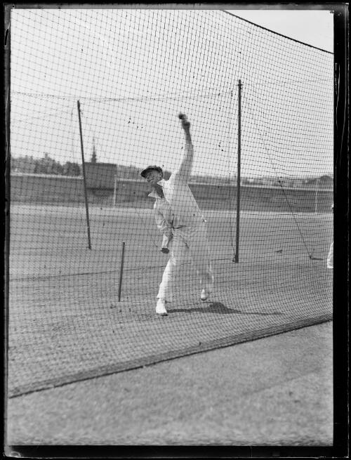 Victorian cricketer Ernest Bromley practising bowling in the nets, New South Wales, 24 January 1935 [picture]